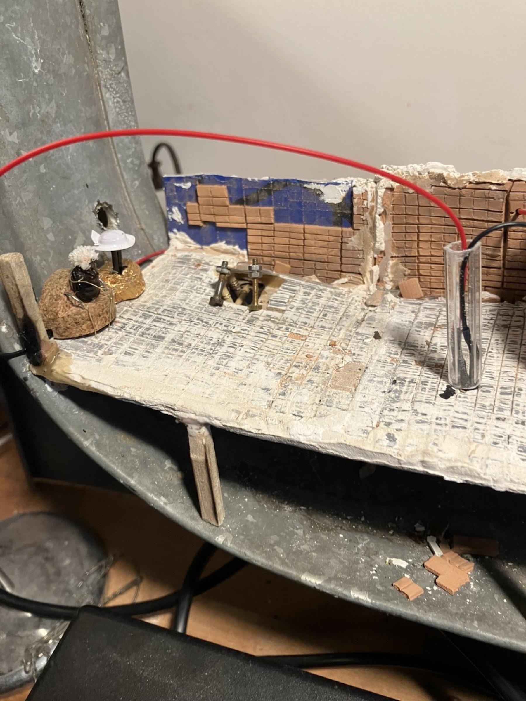 A floor hatch and a beetle inside the underground level