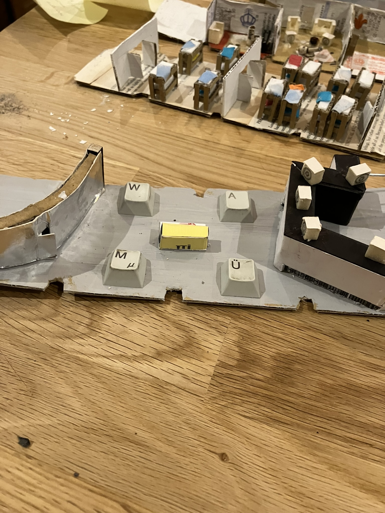 Club floor under construction with keyboard materials as platforms